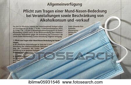 Symbol picture Protection against infection law, mouth protection mask is based on a general decree on the obligation to wear a mouth-nose cover as well as restrictions on the sale of alcohol, Stuttgarter Zeitung, Corona crisis, Stuttgart,... View Large Photo Image Stock Photograph - Symbol picture Protection against infection law, mouth protection mask is based on a general decree on the obligation to wear a mouth-nose cover as well as restrictions on the sale of alcohol, Stuttgarter Zeitung, Corona crisis, Stuttgart,.... Fotosearch