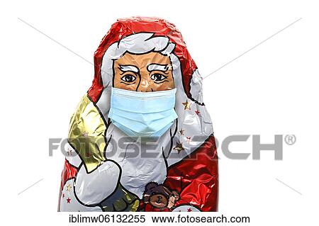 Symbolic image of Christmas during the Corona crisis, a chocolate Santa Claus with a face mask, Stuttgart, Baden-Württemberg, Germany, Europe View Large Photo Image Stock Photography - Symbolic image of Christmas during the Corona crisis, a chocolate Santa Claus with a face mask, Stuttgart, Baden-Württemberg, Germany, Europe. Fotosearch