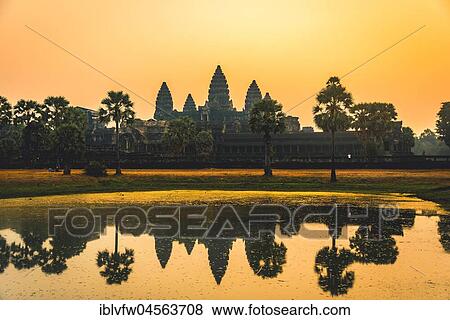 Temple complex of Angkor Wat reflected in the water basin, sunrise, Angkor Wat, Angkor Archaeological Park, Siem Reap Province, Cambodia, Asia View Large Photo Image Stock Photo - Temple complex of Angkor Wat reflected in the water basin, sunrise, Angkor Wat, Angkor Archaeological Park, Siem Reap Province, Cambodia, Asia. Fotosearch