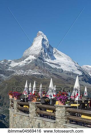 Terrace of a restaurant, snow-covered Matterhorn, top station Sunegga, Valais, Switzerland, Europe View Large Photo Image Stock Photograph - Terrace of a restaurant, snow-covered Matterhorn, top station Sunegga, Valais, Switzerland, Europe. Fotosearch