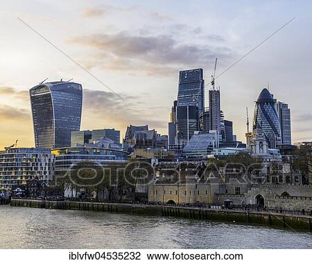 Thames, Tower of London, skyline of the City of London, with the buildings Gherkin, Leadenhall Building and Walkie Talkie Building, at sunset, London, England, United Kingdom, Europe View Large Photo Image Stock Image - Thames, Tower of London, skyline of the City of London, with the buildings Gherkin, Leadenhall Building and Walkie Talkie Building, at sunset, London, England, United Kingdom, Europe. Fotosearch