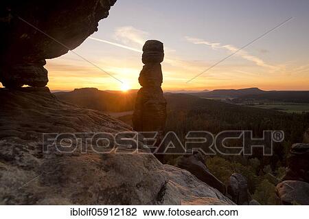 The Barbarine at Pfaffenstein at sunrise, Pfaffendorf, Saxony, Germany, Elbe Sandstone Mountains, National Park Saxon Switzerland, Europe View Large Photo Image Stock Image - The Barbarine at Pfaffenstein at sunrise, Pfaffendorf, Saxony, Germany, Elbe Sandstone Mountains, National Park Saxon Switzerland, Europe. Fotosearch