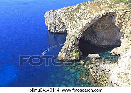 Picture - The Blue Grotto, natural sea arch and cliffs, Wied iz-Zurrieq, Malta, Europe. Fotosearch