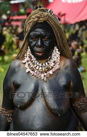 Stock Image - The highland tribes, Mendi-Widows, presenting themselves at the big Sing-Sing of Goroka, Papua New Guinea, Oceania. Fotosearch