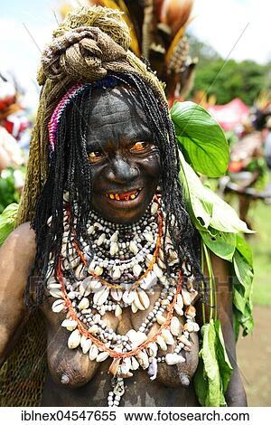 Stock Photography - The highland tribes, Mendi-Widows, presenting themselves at the big Sing-Sing of Goroka, Papua New Guinea, Oceania. Fotosearch