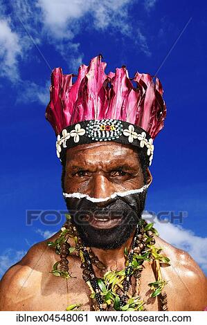 Stock Image - The highland tribes present themselves at the annual Sing Sing of Goroka, Papua New Guinea, Oceania. Fotosearch
