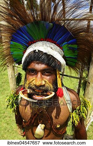 Stock Photo - The highland tribes presenting themselves at the Sing Sing of Goroka, Papua New Guinea, Oceania. Fotosearch