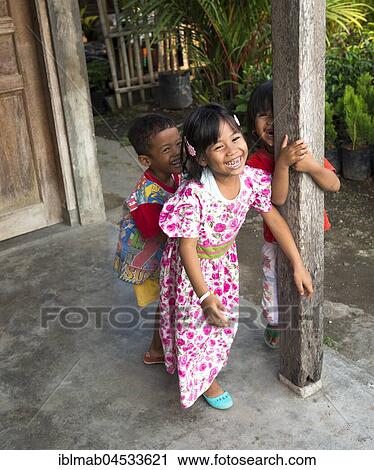 Three cheerful Indonesian children, Yogyakarta, Java, Indonesia, Asia View Large Photo Image Stock Image - Three cheerful Indonesian children, Yogyakarta, Java, Indonesia, Asia. Fotosearch