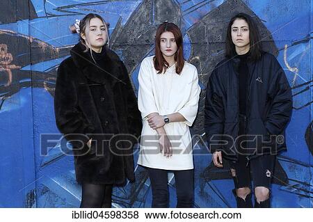 Three girls, teenagers, rebels, bad mood, negative, negative mood, boycott, boycott, relationship, friends, piercing, quarrel, graffiti View Large Photo Image Stock Photo - Three girls, teenagers, rebels, bad mood, negative, negative mood, boycott, boycott, relationship, friends, piercing, quarrel, graffiti. Fotosearch