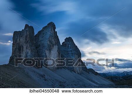 Three Peaks in the Dolomites at the Blue Hour, South Tyrol, Italy, Europe View Large Photo Image Stock Photo - Three Peaks in the Dolomites at the Blue Hour, South Tyrol, Italy, Europe. Fotosearch