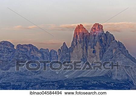 Three Peaks in the evening light, Dolomites, Sesto, South Tyrol, Region Trentino-South Tyrol, Italy, Europe View Large Photo Image Picture - Three Peaks in the evening light, Dolomites, Sesto, South Tyrol, Region Trentino-South Tyrol, Italy, Europe. Fotosearch