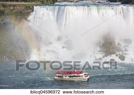 Tourist boat at the waterfall, American Falls, Niagara Falls, Ontario, Canada, North America View Large Photo Image Stock Image - Tourist boat at the waterfall, American Falls, Niagara Falls, Ontario, Canada, North America. Fotosearch