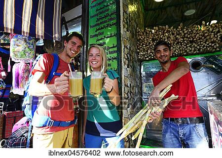 Tourist drink sugarcane-syrop, Al Balat, Amman, Jordan, Asia View Large Photo Image Stock Image - Tourist drink sugarcane-syrop, Al Balat, Amman, Jordan, Asia. Fotosearch