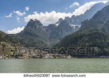 Tourist village Àlleghe at Àlleghe lake, Cordevole valley, at top the Civetta-Moiazza group, Dolomites, province of Belluno, Veneto region, Italy, Europe View Large Photo Image Stock Photo - Tourist village Àlleghe at Àlleghe lake, Cordevole valley, at top the Civetta-Moiazza group, Dolomites, province of Belluno, Veneto region, Italy, Europe. Fotosearch