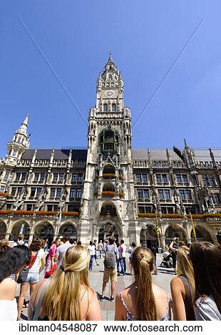 Tourists watching chime, New town hall, Marienplatz, old town, Munich, Upper Bavaria, Bavaria, Germany, Europe View Large Photo Image Stock Photo - Tourists watching chime, New town hall, Marienplatz, old town, Munich, Upper Bavaria, Bavaria, Germany, Europe. Fotosearch