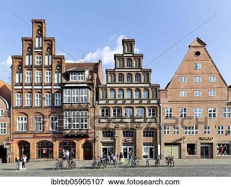 Stock Photo - Town houses Am Sande, North German brick houses with stepped gables, Lüneburg, Lower Saxony, Germany, Europe. Fotosearch