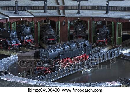 Toy train, tender locomotive on turntable with ring engine shed, Märklin HO, replica of the class 85 007 of the German Reichsbahn, Germany, Europe View Large Photo Image Stock Image - Toy train, tender locomotive on turntable with ring engine shed, Märklin HO, replica of the class 85 007 of the German Reichsbahn, Germany, Europe. Fotosearch