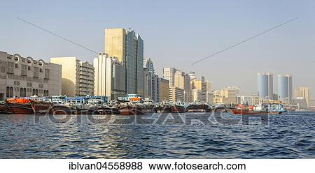 Traditional boats, dhows, Dubai Creek, Dubai, United Arab Emirates, Asia View Large Photo Image Stock Photo - Traditional boats, dhows, Dubai Creek, Dubai, United Arab Emirates, Asia. Fotosearch