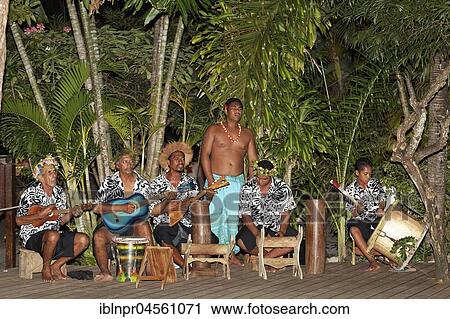 Traditional music band under palm trees, musicians, Bora Bora island, society islands, French Polynesia, Oceania View Large Photo Image Stock Image - Traditional music band under palm trees, musicians, Bora Bora island, society islands, French Polynesia, Oceania. Fotosearch