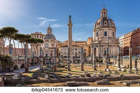 Stock Image - Trajan's Forum with Trajan's Column and columns of the Basilica Ulpia, at back right churches of Chiesa SS Nome di Maria e Bernardo, left Santa Maria di Loreto, Rome, Lazio, Italy, Europe. Fotosearch