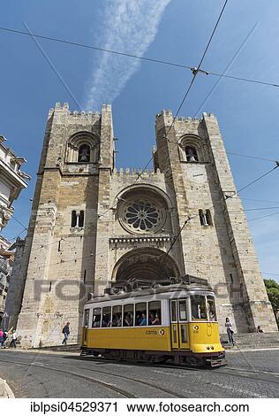 Tram passes by Catedral Sé Patriarcal, Lisbon, Portugal, Europe View Large Photo Image Stock Image - Tram passes by Catedral Sé Patriarcal, Lisbon, Portugal, Europe. Fotosearch