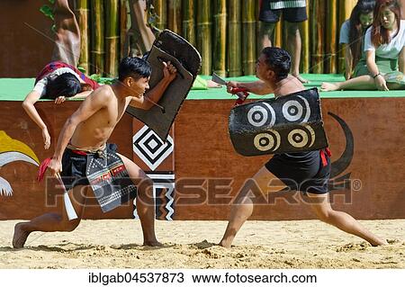 Stock Image - Tribal ritual dance at the Hornbill Festival, Kohima, Nagaland, India, Asia. Fotosearch