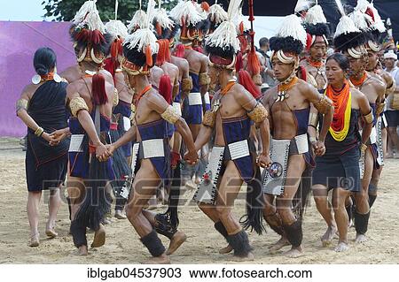 Stock Image - Tribal ritual dance at the Hornbill Festival, Kohima, Nagaland, India, Asia. Fotosearch