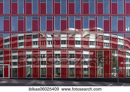 Stock Photo - Trivago building reflected in the Capricorn office building, Uniper headquarters, Medienhafen Düsseldorf, North Rhine-Westphalia, Germany, Europe. Fotosearch
