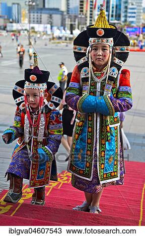 Two girls in traditional traditional festive clothes, festival of the Mongolian national costume, Ulanbator, Mongolia, Asia View Large Photo Image Stock Image - Two girls in traditional traditional festive clothes, festival of the Mongolian national costume, Ulanbator, Mongolia, Asia. Fotosearch