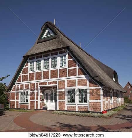 Typical half-timbered house, thatched house, Apfelhof, Jork, Altes Land, Lower Saxony, Germany, Europe View Large Photo Image Stock Image - Typical half-timbered house, thatched house, Apfelhof, Jork, Altes Land, Lower Saxony, Germany, Europe. Fotosearch
