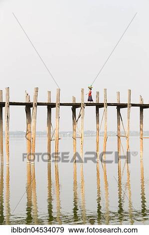 Stock Photo - U Bein bridge, Taungthaman Lake, Mandalay region, Myanmar, Asia. Fotosearch