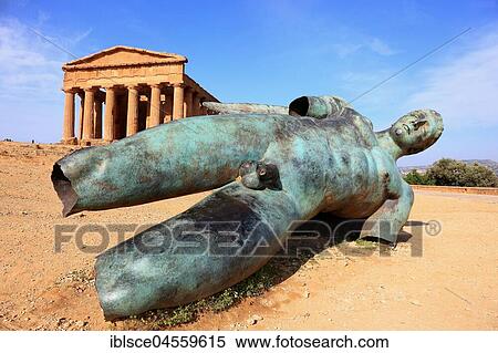 Valle dei Templi di Agrigento, Concordia temple with the sculpture of the crashed Icarus by the artist Igor Mitorgi, Agrigento, Sicily, Italy, Europe View Large Photo Image Stock Photography - Valle dei Templi di Agrigento, Concordia temple with the sculpture of the crashed Icarus by the artist Igor Mitorgi, Agrigento, Sicily, Italy, Europe. Fotosearch