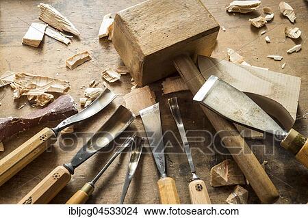 Picture - Various woodworking tools on a workbench, wooden mallet and wood carving knives, wooden mask carver, Bad Aussee, Styria, Austria, Europe. Fotosearch