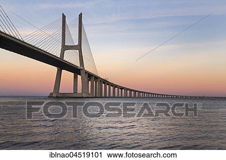 Vasco da Gama Bridge over the River Tagus, sunset, Lisbon, Portugal, Europe View Large Photo Image Stock Image - Vasco da Gama Bridge over the River Tagus, sunset, Lisbon, Portugal, Europe. Fotosearch