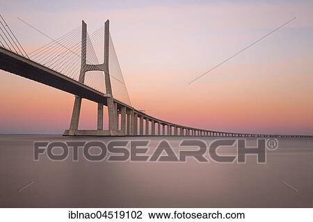 Vasco da Gama Bridge over the River Tagus, sunset, Lisbon, Portugal, Europe View Large Photo Image Stock Image - Vasco da Gama Bridge over the River Tagus, sunset, Lisbon, Portugal, Europe. Fotosearch