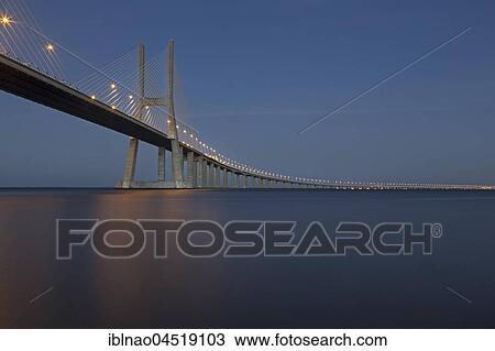 Vasco da Gama bridge over the Tagus river, dusk, Lisbon, Portugal, Europe View Large Photo Image Stock Image - Vasco da Gama bridge over the Tagus river, dusk, Lisbon, Portugal, Europe. Fotosearch