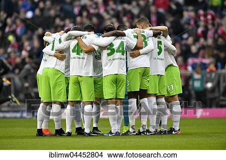VfL Wolfsburg football team, pre-match huddle, Allianz Arena, Munich, Bavaria, Germany, Europe View Large Photo Image Picture - VfL Wolfsburg football team, pre-match huddle, Allianz Arena, Munich, Bavaria, Germany, Europe. Fotosearch