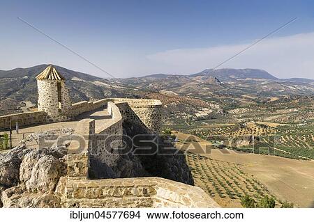 View from Moorish castle, hill with olive trees, white village, Olvera, province of Cadiz, Andalusia, Spain, Europe View Large Photo Image Picture - View from Moorish castle, hill with olive trees, white village, Olvera, province of Cadiz, Andalusia, Spain, Europe. Fotosearch
