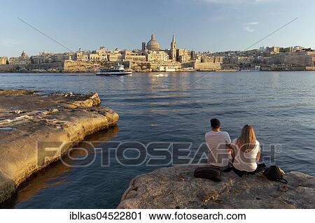 View from rock bank of Valletta, from Sliema, evening light, Valletta, Malta, Europe View Large Photo Image Stock Image - View from rock bank of Valletta, from Sliema, evening light, Valletta, Malta, Europe. Fotosearch