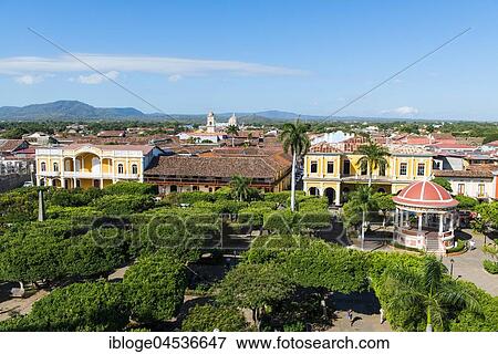 Stock Photo - View from the cathedral Nuestra Senora de la Asuncion to the houses at the Parque Central, Old Town, Granada, Nicaragua, Central America. Fotosearch