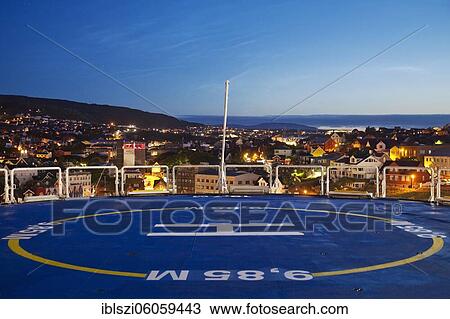 View from the helipad of the ferry Norröna to the capital in the evening, Thorshavn, Streymoy, Faroe Islands, Føroyar, Denmark, Europe View Large Photo Image Stock Image - View from the helipad of the ferry Norröna to the capital in the evening, Thorshavn, Streymoy, Faroe Islands, Føroyar, Denmark, Europe. Fotosearch