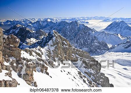 Stock Photo - View from the summit of the Zugspitze, Bavaria, Germany, Europe. Fotosearch