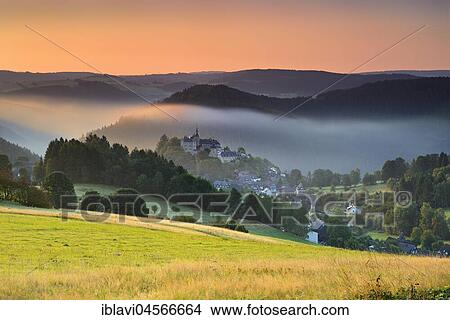 View of castle and village Lauenstein, morning light, morning fog, Ludwigsstadt, Upper Franconia, Bavaria, Germany, Europe View Large Photo Image Picture - View of castle and village Lauenstein, morning light, morning fog, Ludwigsstadt, Upper Franconia, Bavaria, Germany, Europe. Fotosearch