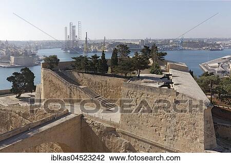 Stock Image - View of St. Peter Bastion and Grand Harbor, Valletta, Malta, Europe. Fotosearch