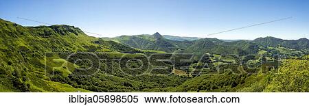Stock Photography - View of the Mandailles valley and Puy Griou in the Auvergne volcanoes regional natural park, Cantal, Auvergne Rhone Alpes, France, Europe. Fotosearch