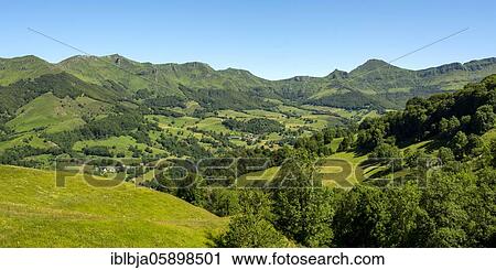 Stock Image - View of the Mandailles valley in the Auvergne volcanoes regional natural park, Cantal department, Auvergne Rhone Alpes, France, Europe. Fotosearch