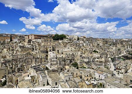 Stock Photograph - View of the old town cut out of the stone, the so-called Sassi of Matera, Basilicata, Italy, Europe. Fotosearch