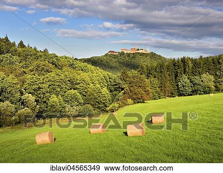 View of the Wartburg Castle, bales of hay in meadow, Thuringian Forest, Eisenach, Thuringia, Germany, Europe View Large Photo Image Stock Photo - View of the Wartburg Castle, bales of hay in meadow, Thuringian Forest, Eisenach, Thuringia, Germany, Europe. Fotosearch