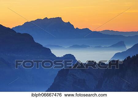 Stock Photograph - View over the Muota valley with Pilatus, Schwyz, Switzerland, Europe. Fotosearch