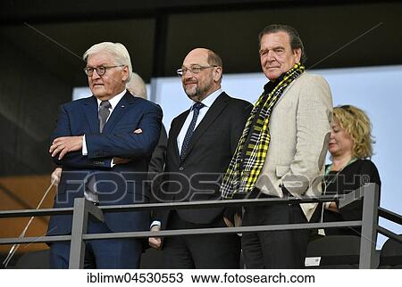 Stock Image - VIP tribune, Federal President Frank-Walter Steinmeier on the left, SPD Chancellor candidate Martin Schulz in the middle, former Chancellor Gerhard Schröder on the right, DFB-Pokalfinale, Olympiastadion Berlin, Germany, Europe. Fotosearch